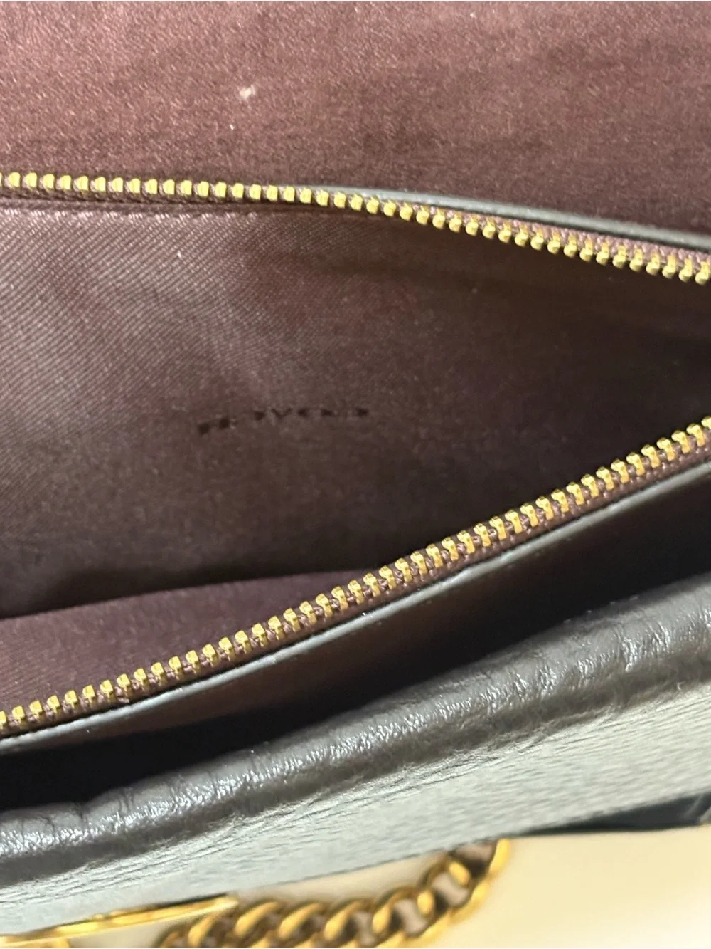 Coach sleek black